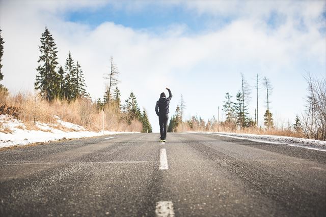 man-in-a-winner-pose-walking-on-the-road-picjumbo-com_R.jpg